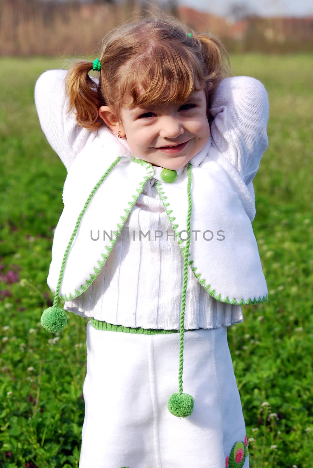 Beauty little girl in white dress