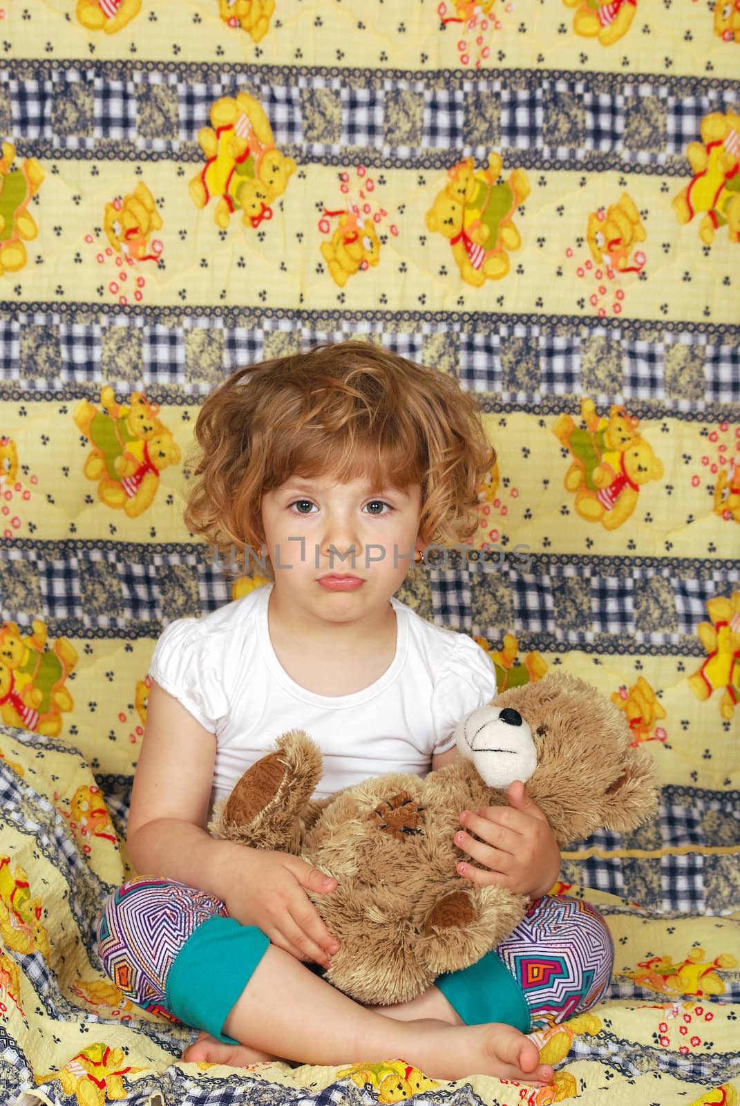 Beauty sleepy little girl studio shot