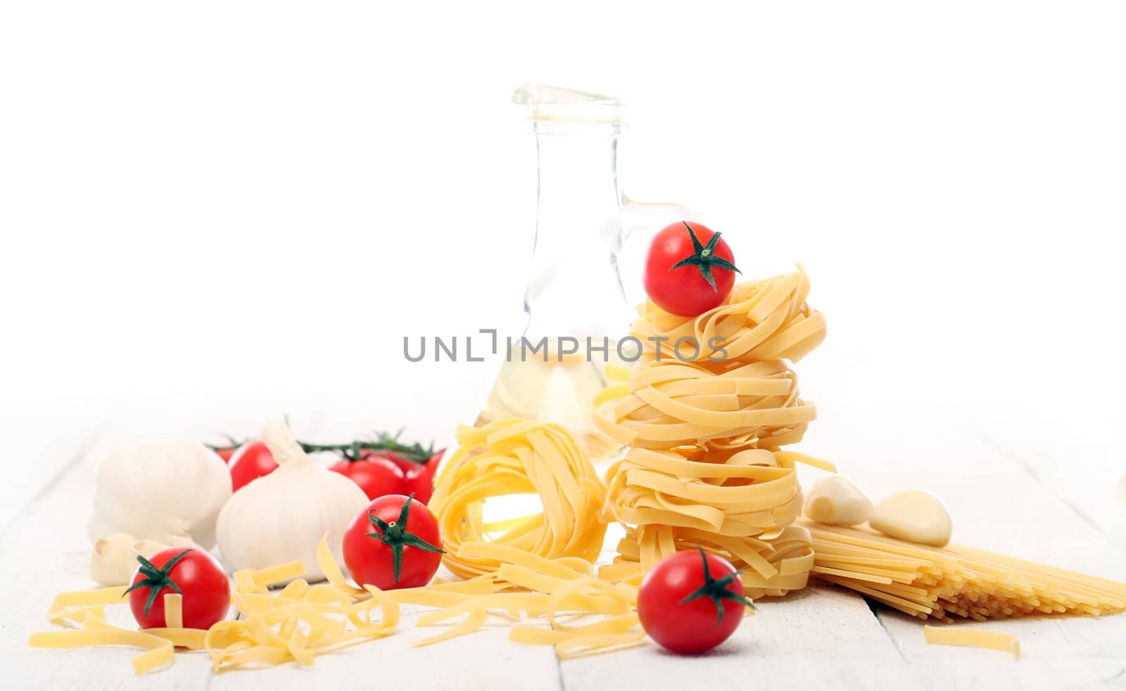 Spaghetti with vegetables isolated on white background