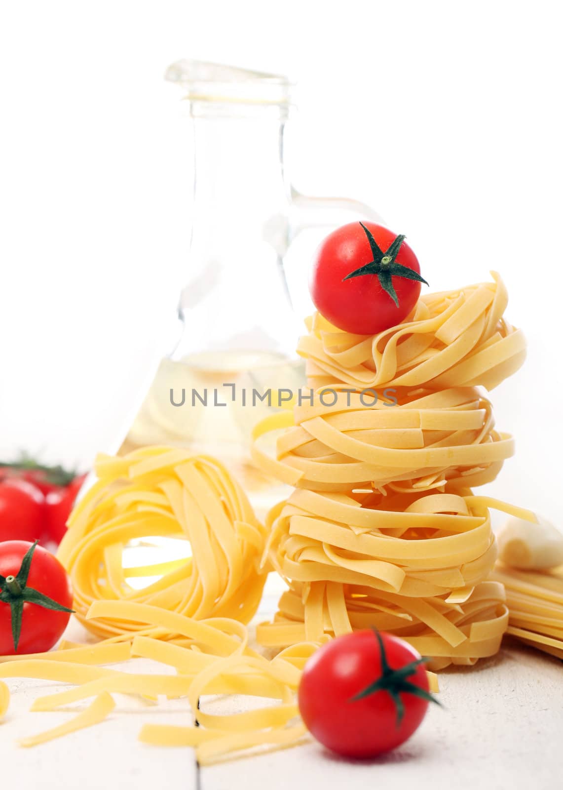 Spaghetti with vegetables isolated on white background