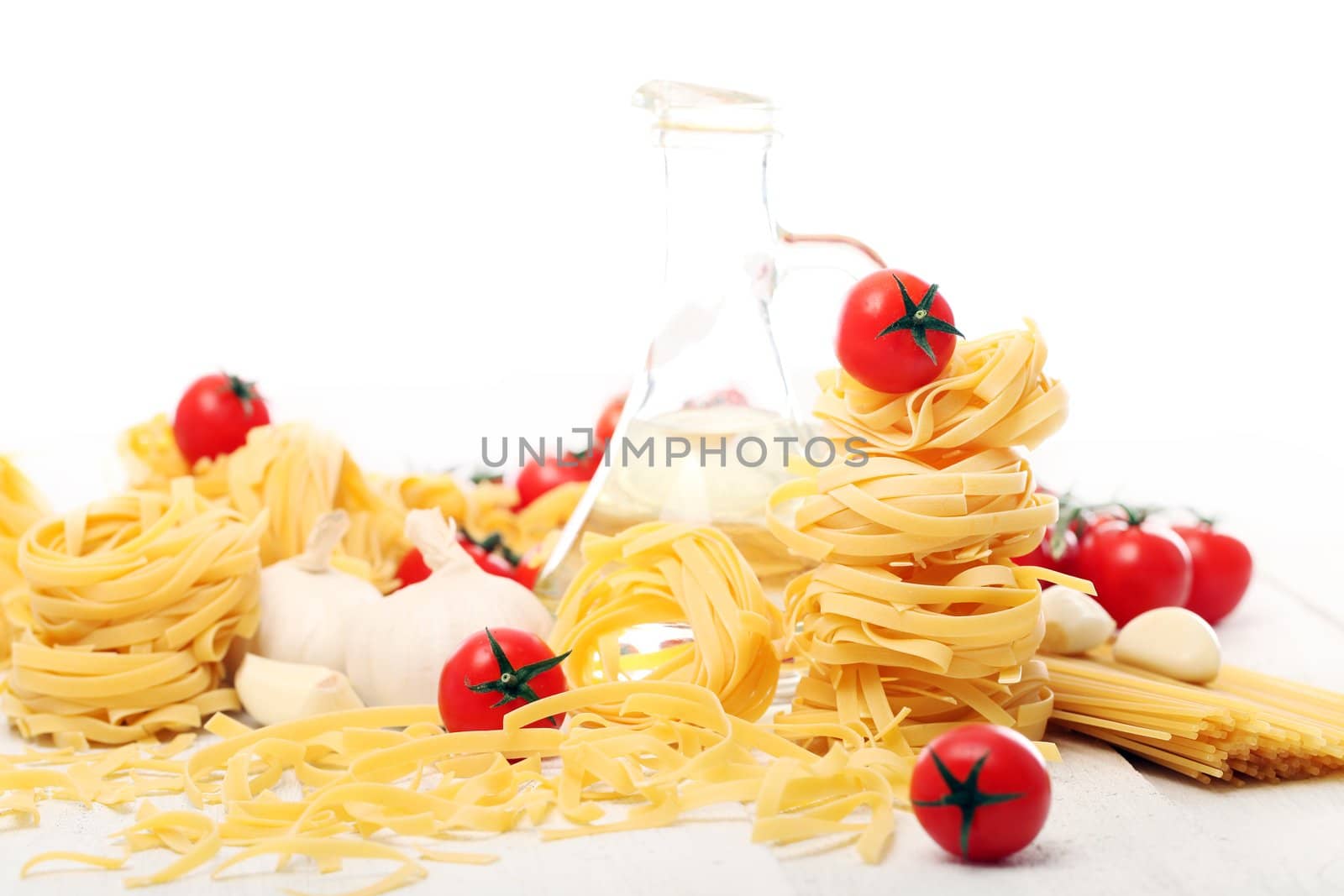 Spaghetti with vegetables isolated on white background