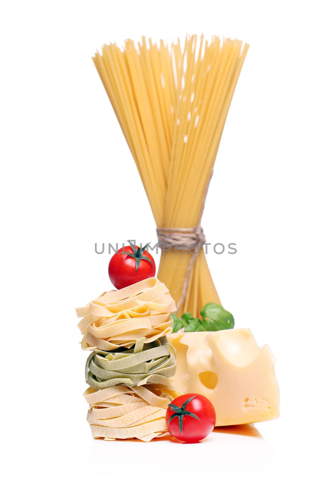 Spaghetti with vegetables isolated on white background