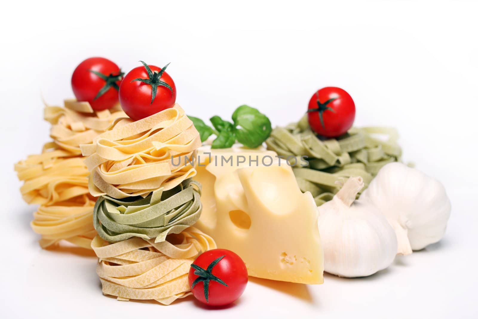 Spaghetti with vegetables isolated on white background