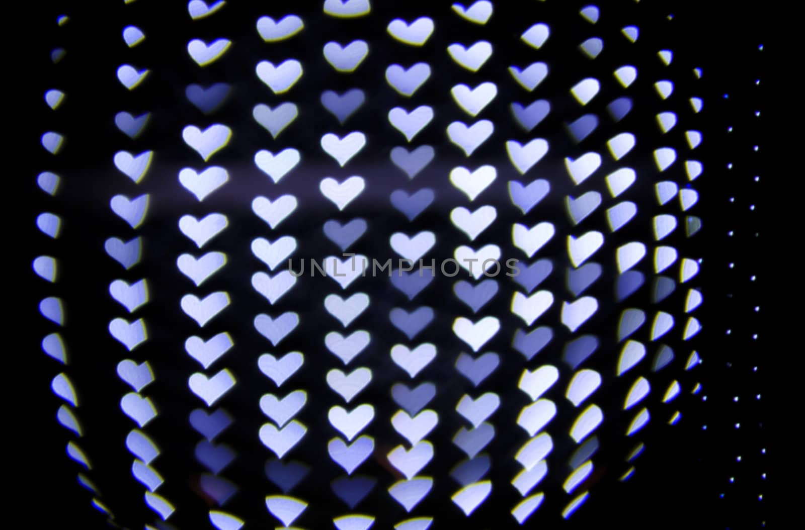 Defocused hearts light background