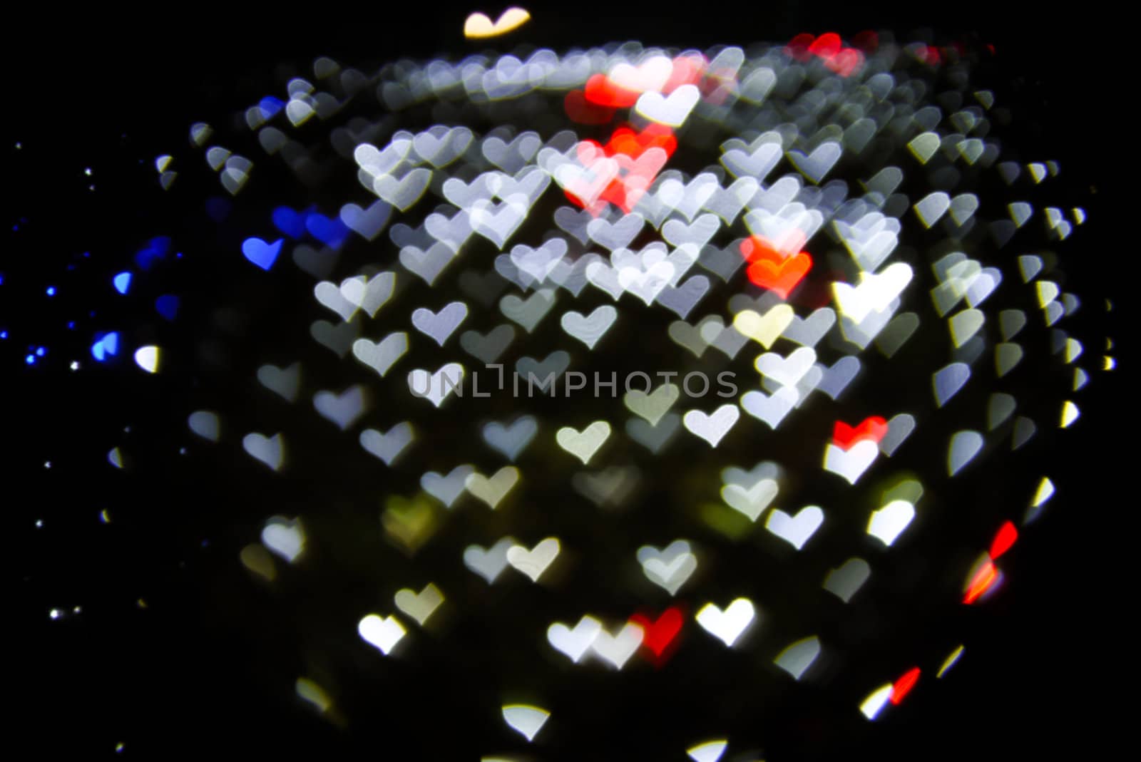 Defocused hearts light background