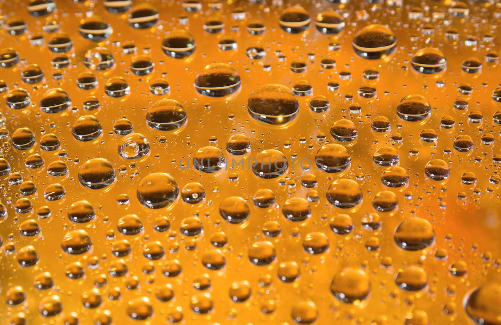 yellow water droplets background .close up of water drops