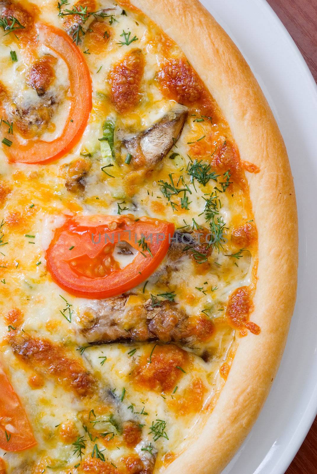 Pizza and italian kitchen. Studio. ,Close-up.tomatoes,sprats