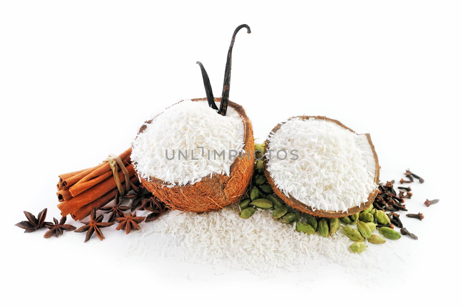 Halves of coconut parts is filled with crumbs and spice