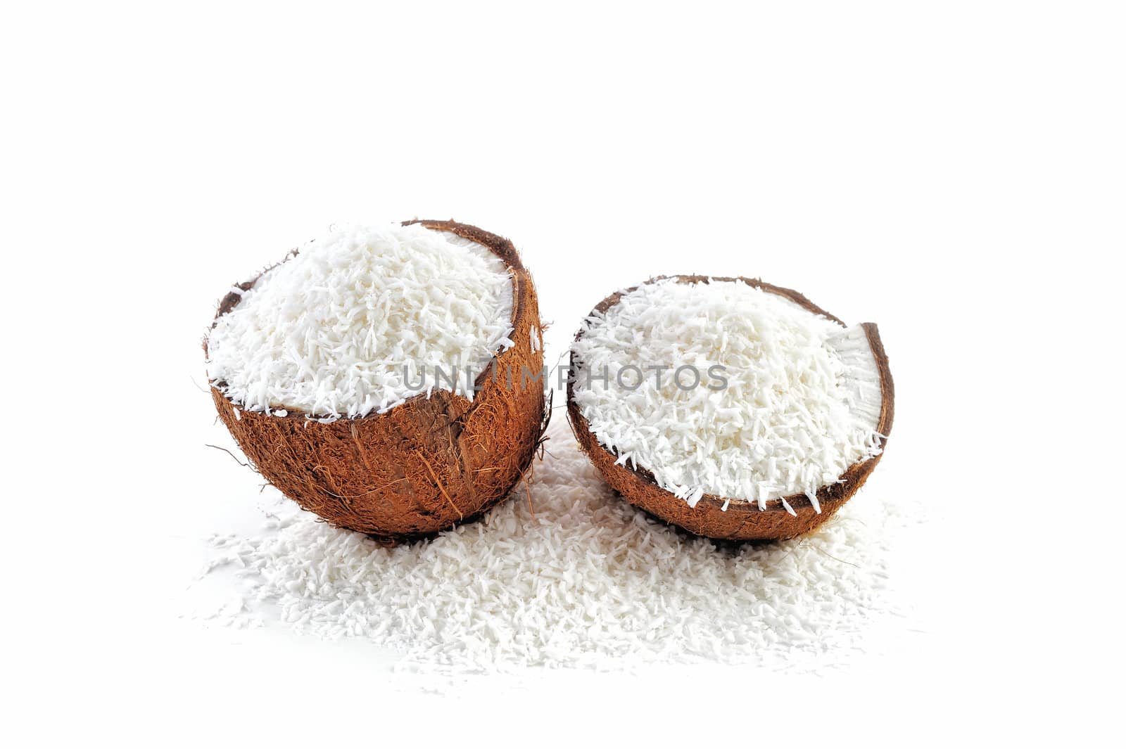 Halves of coconut parts is filled with crumbs
