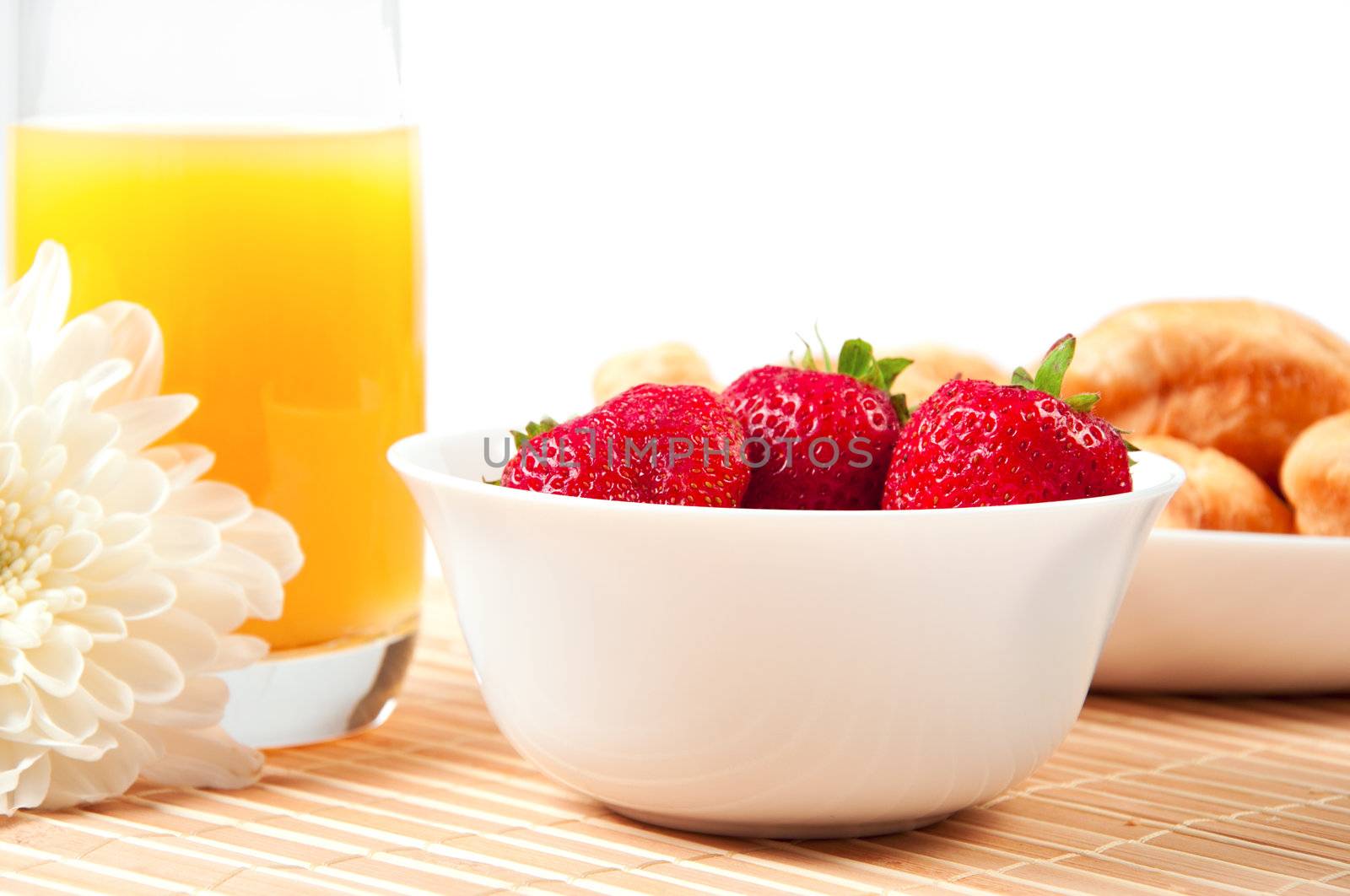 Breakfast with berries,orange juice and croissant, early breakfast