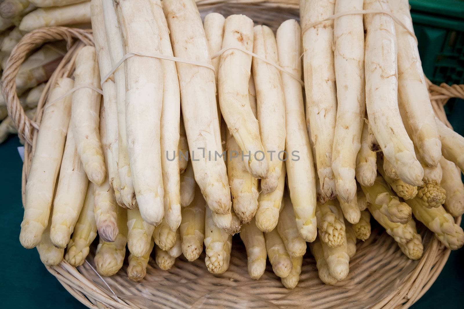 White asparagus for sale on a French market place. Shallow DOF.