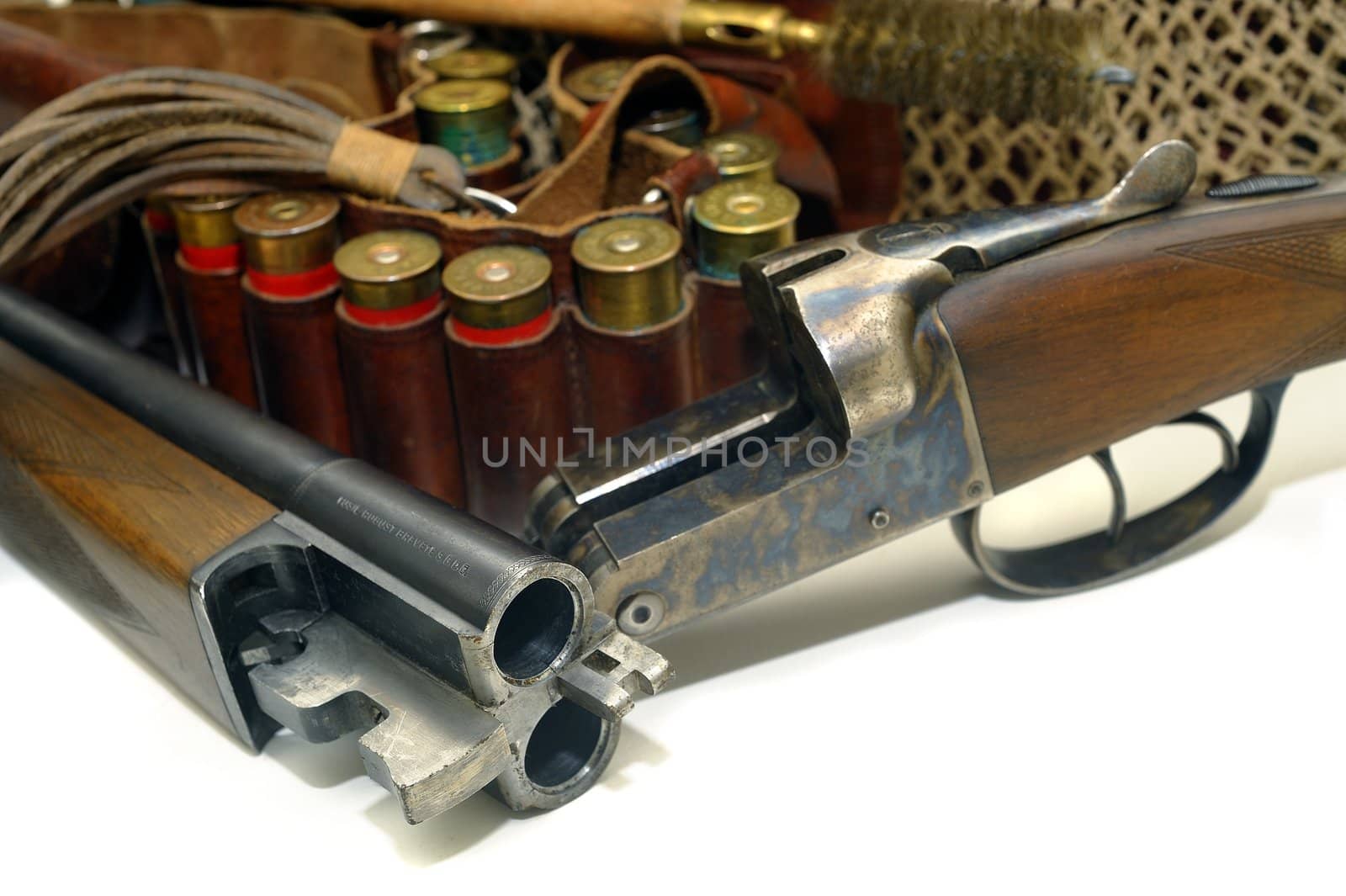 shotgun and its cartridges. Still life representing hunting.