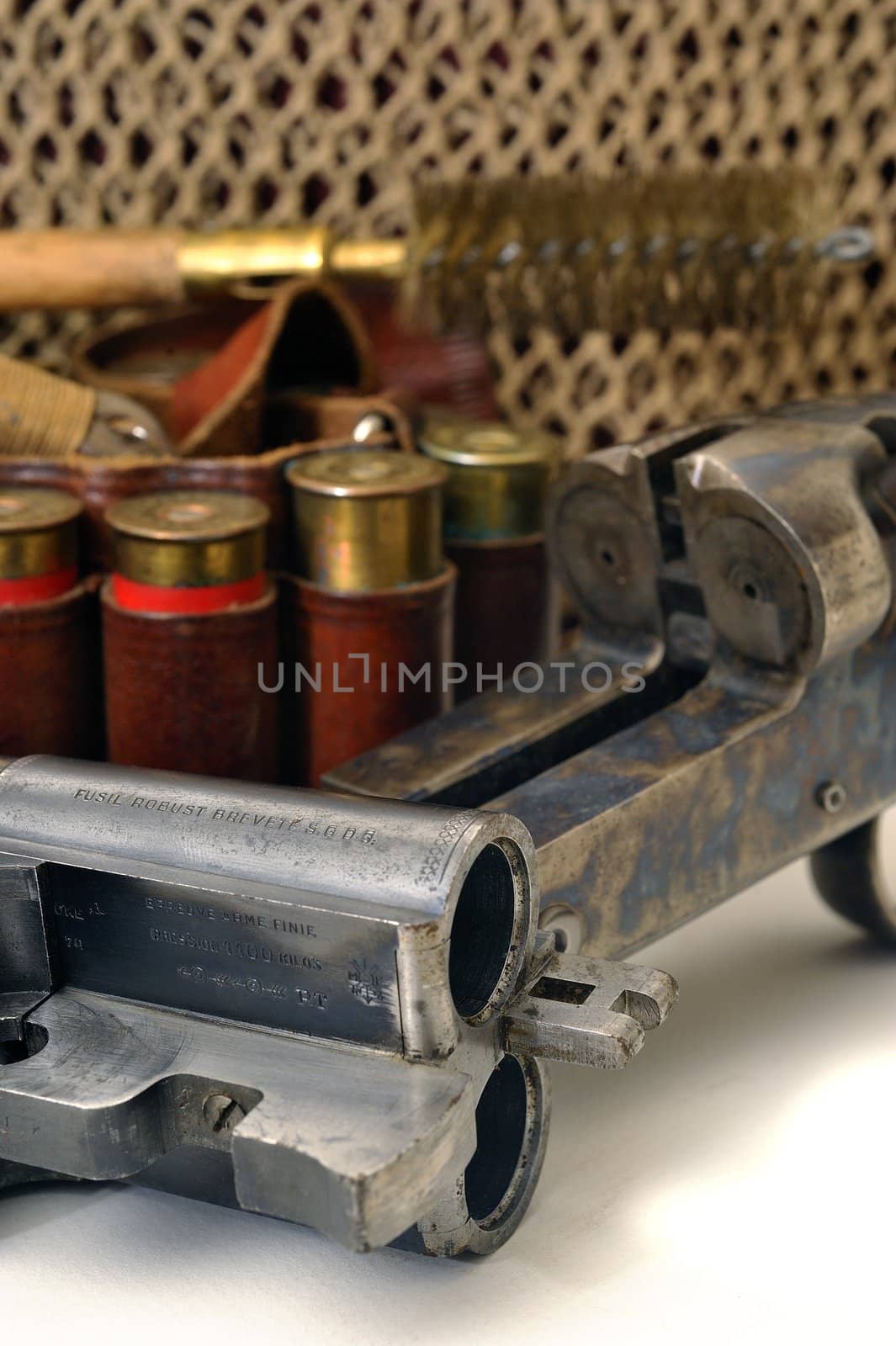 shotgun and its cartridges. Still life representing hunting.