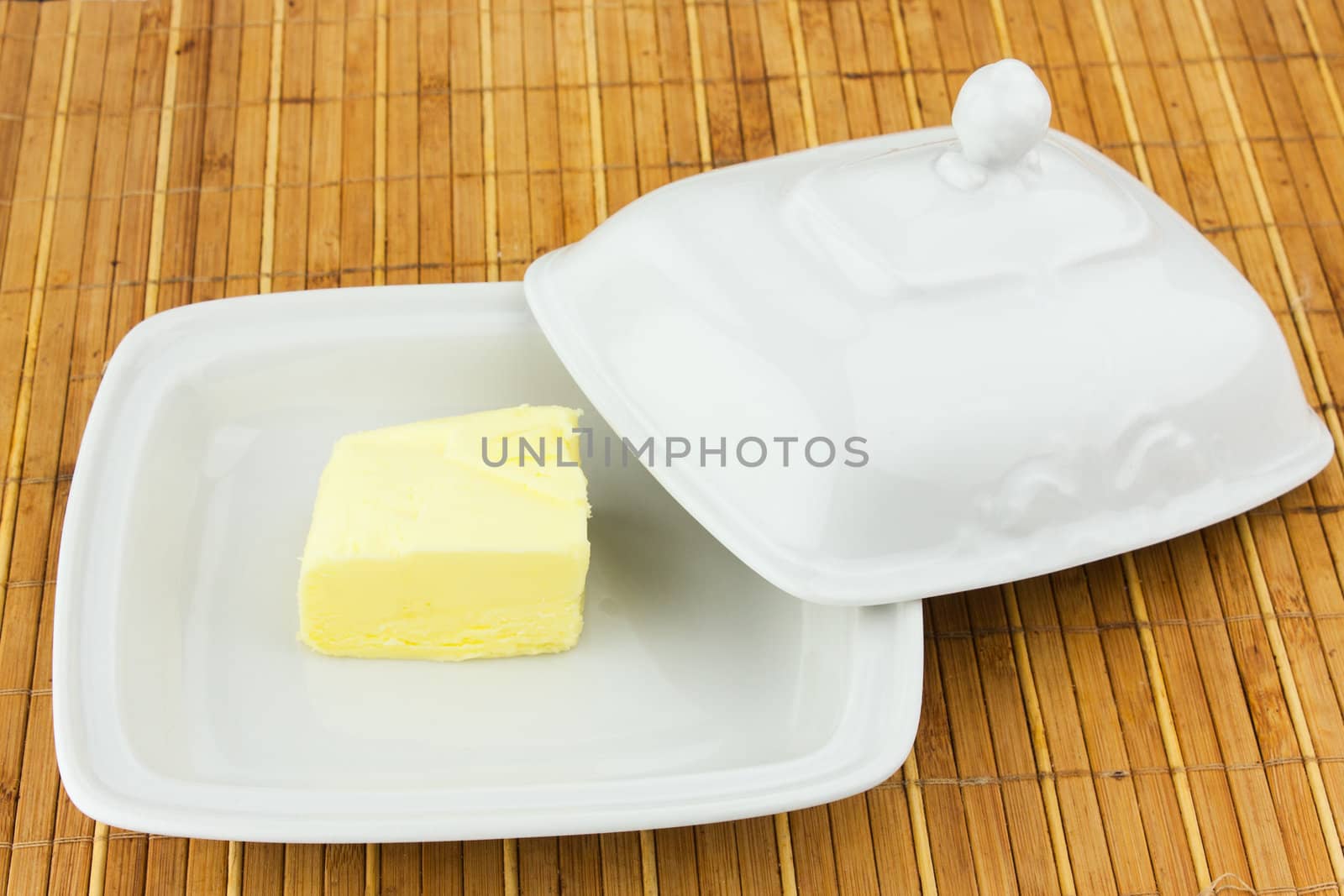 oval dish with the oil cap on a bamboo napkin