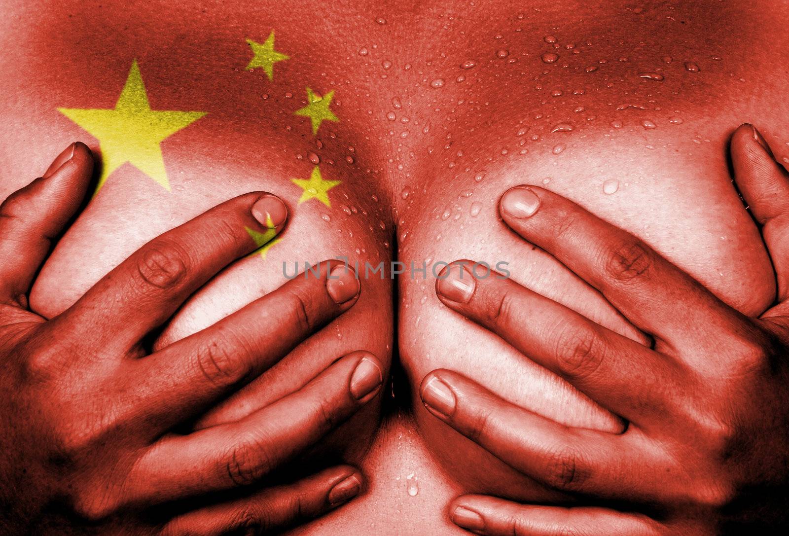 Sweaty upper part of female body, hands covering breasts, flag of China