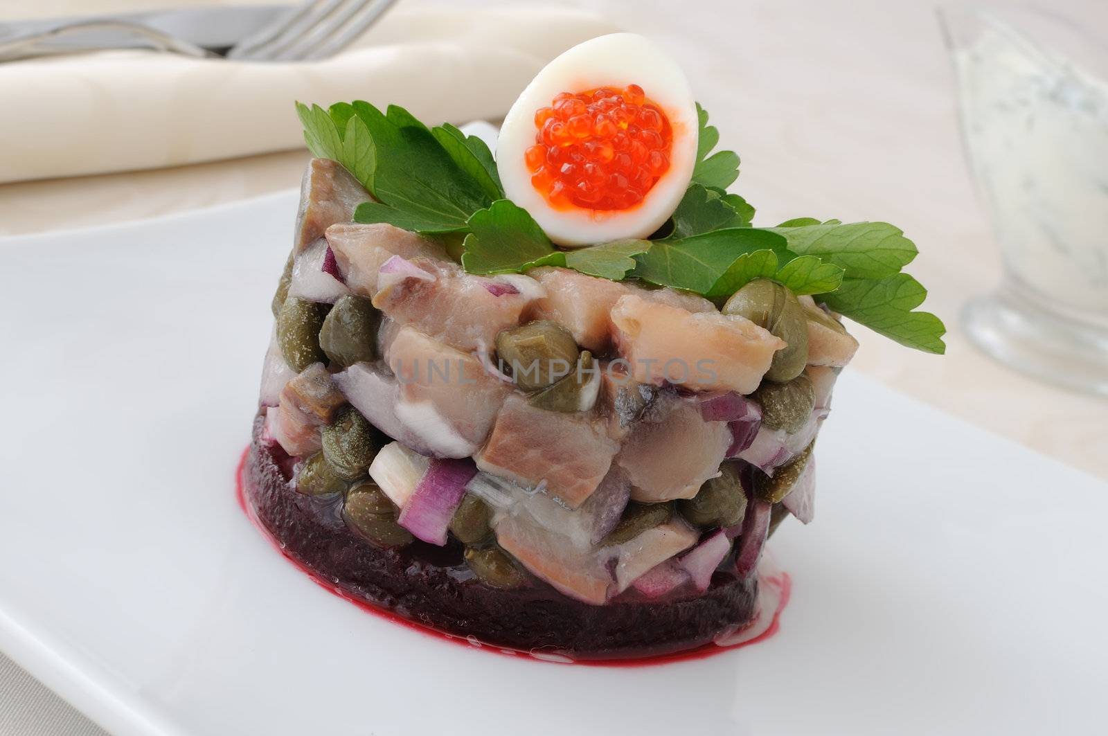 Herring tartare with capers and dill cream sauce