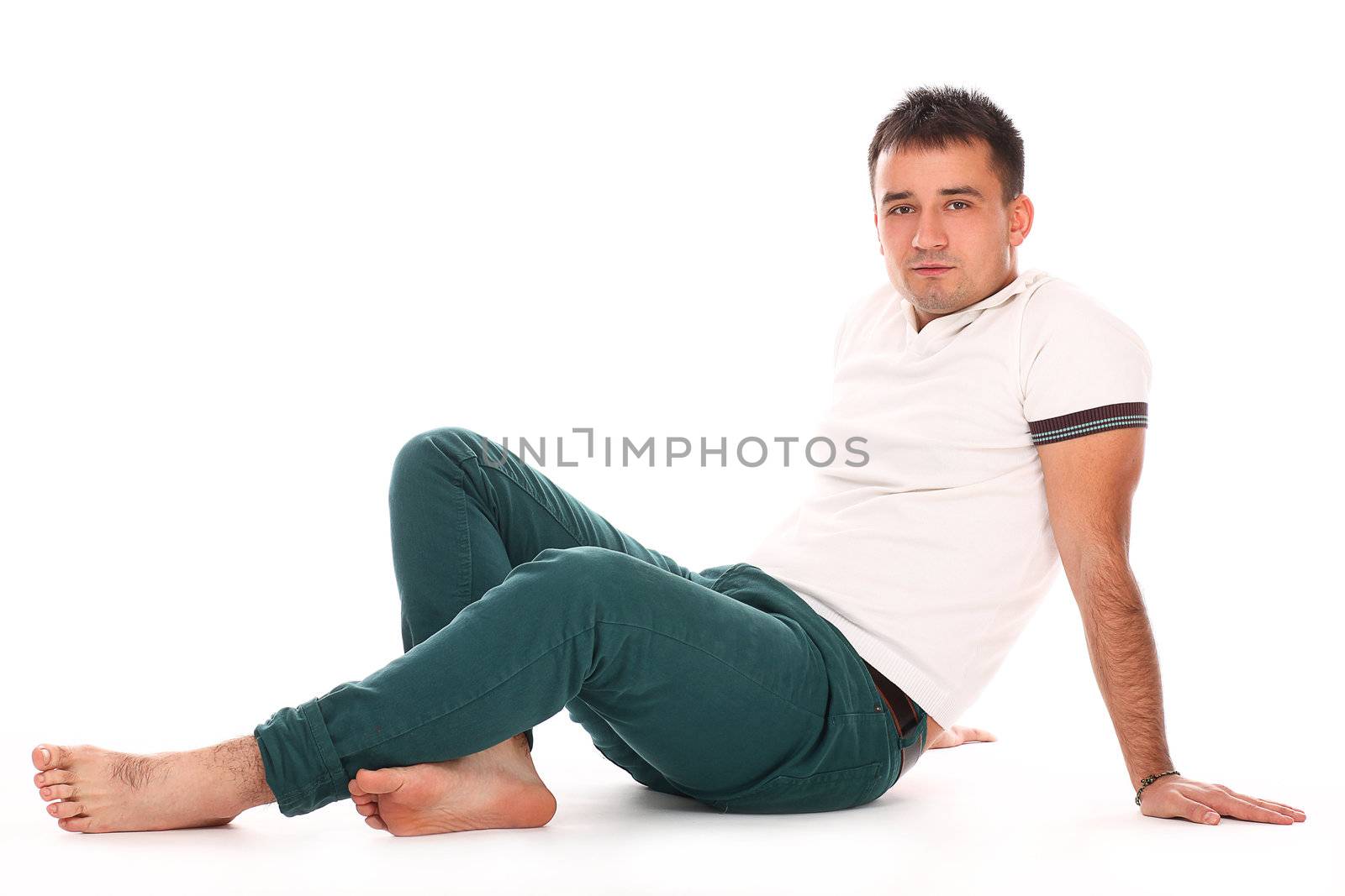 Young handsome man isolated over white background