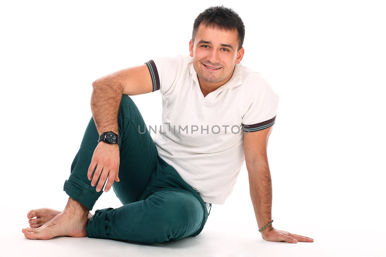 Young handsome man isolated over white background