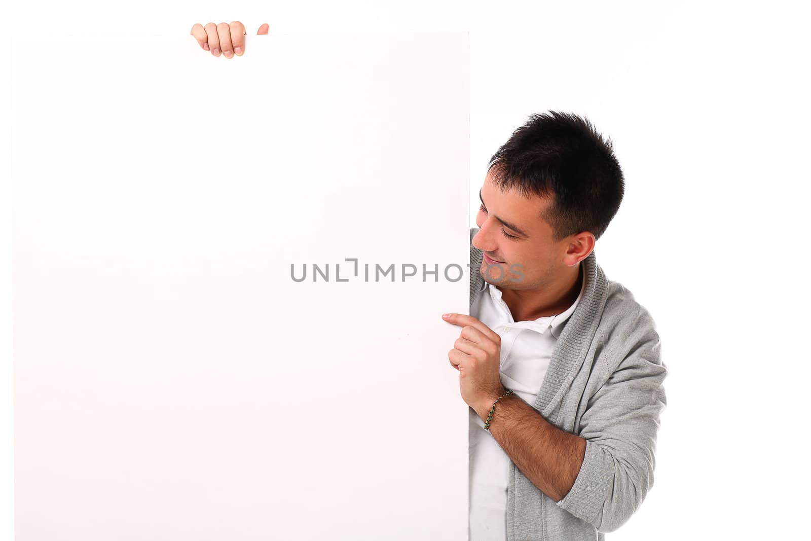 Young handsome man with board isolated over white background