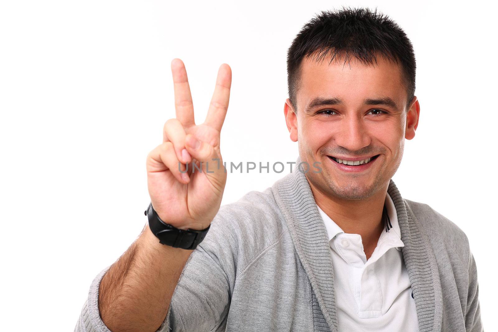 Young handsome man isolated over white background