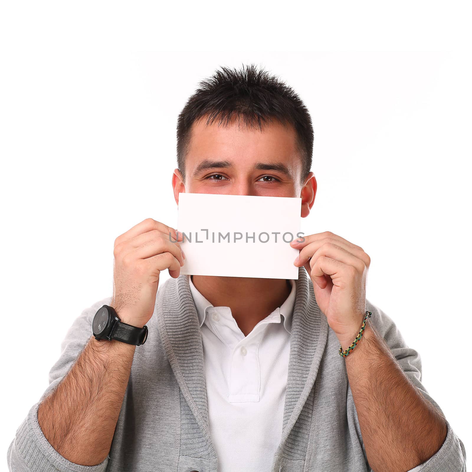 Young handsome man with board isolated over white background