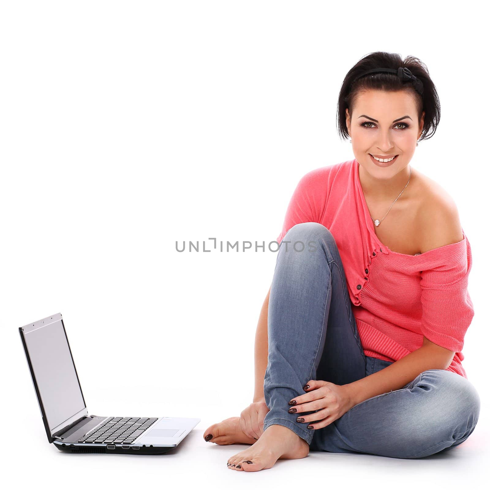 Young happy woman with laptop isolated over white background