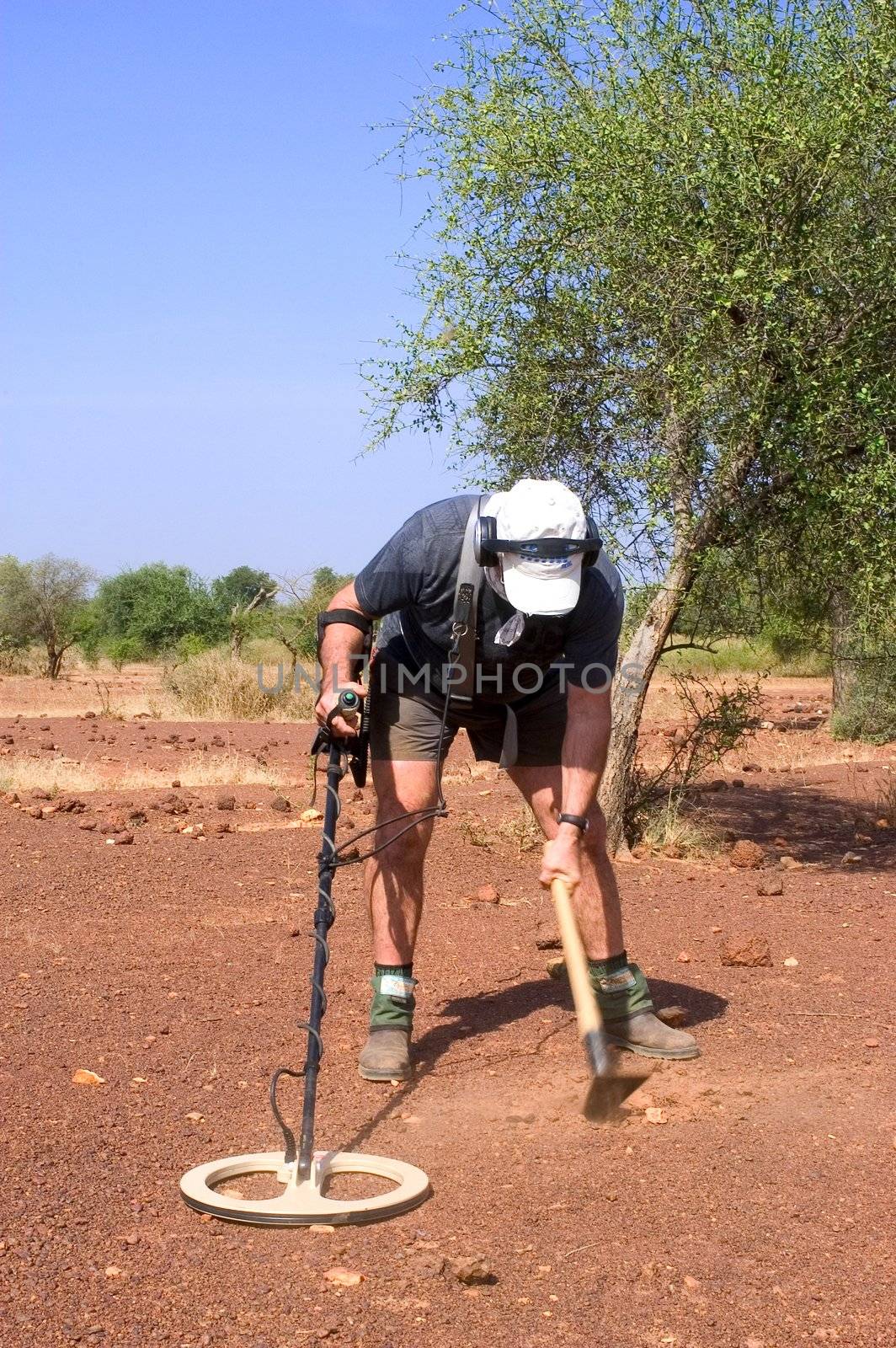 Seek of gold by French in Burkina Faso. Equipped with metal detectors they seeks nuggets in the area of Koupela right in the middle of the bush.