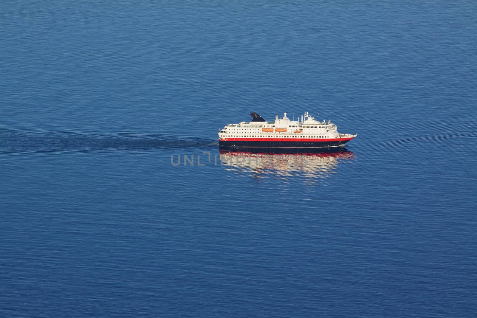 Aerial view of traditional norwegian cruise ship in tranquil blue ocean