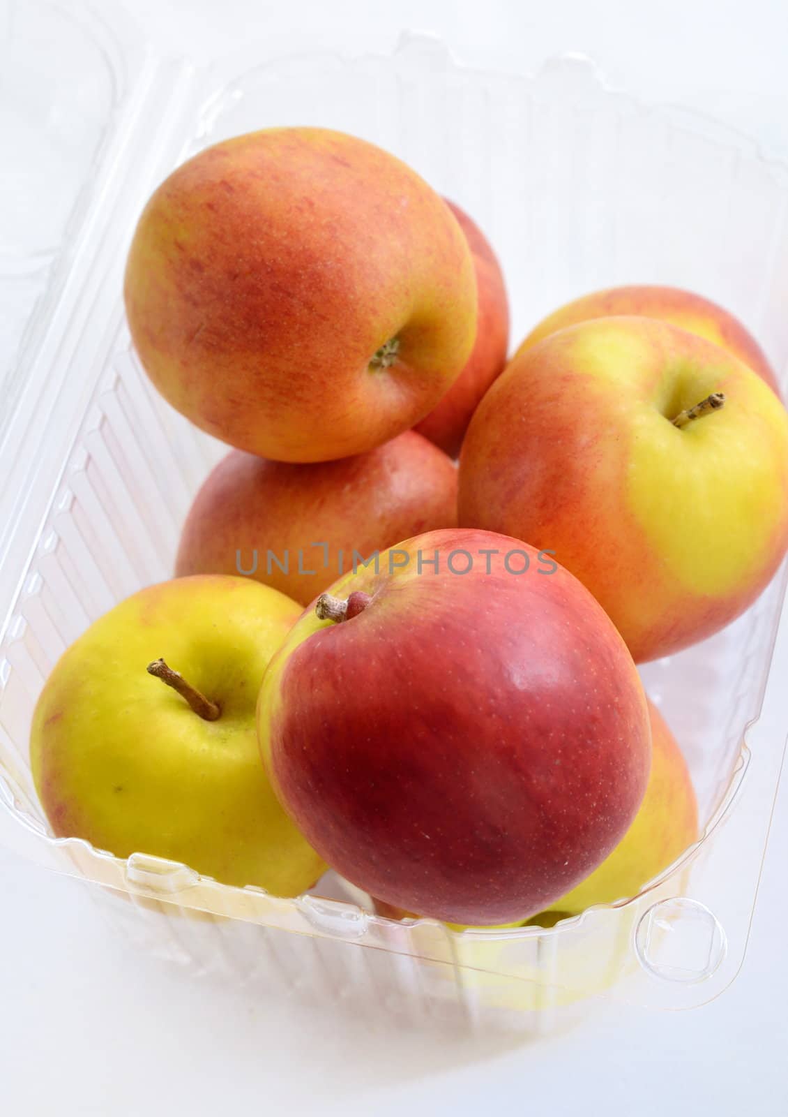 apples in package isolated on white
