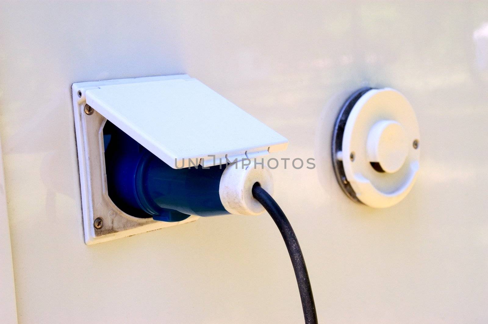 power supply of motor home in a camp-site. Catch connected on the vehicle.