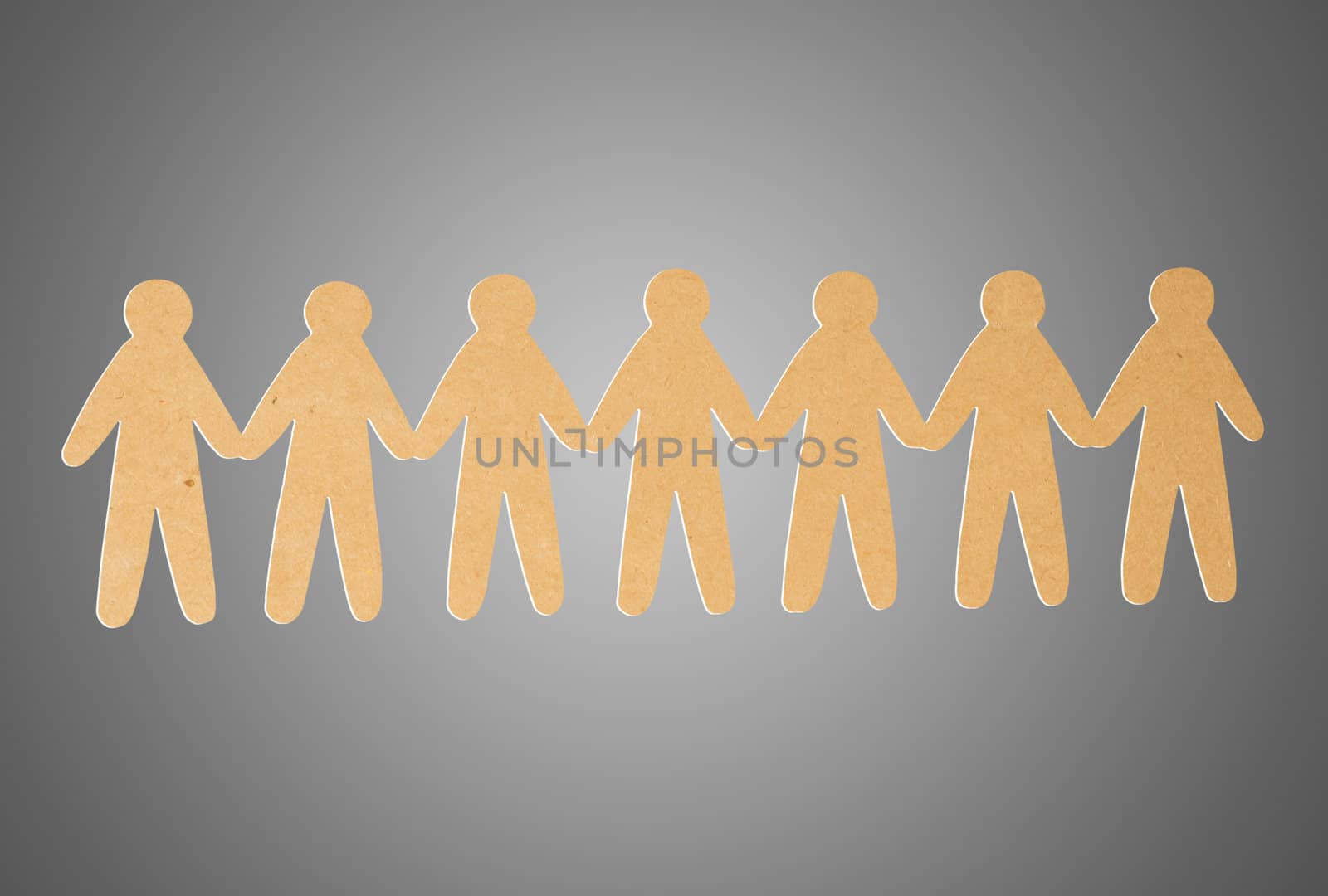team of paper people on grey background