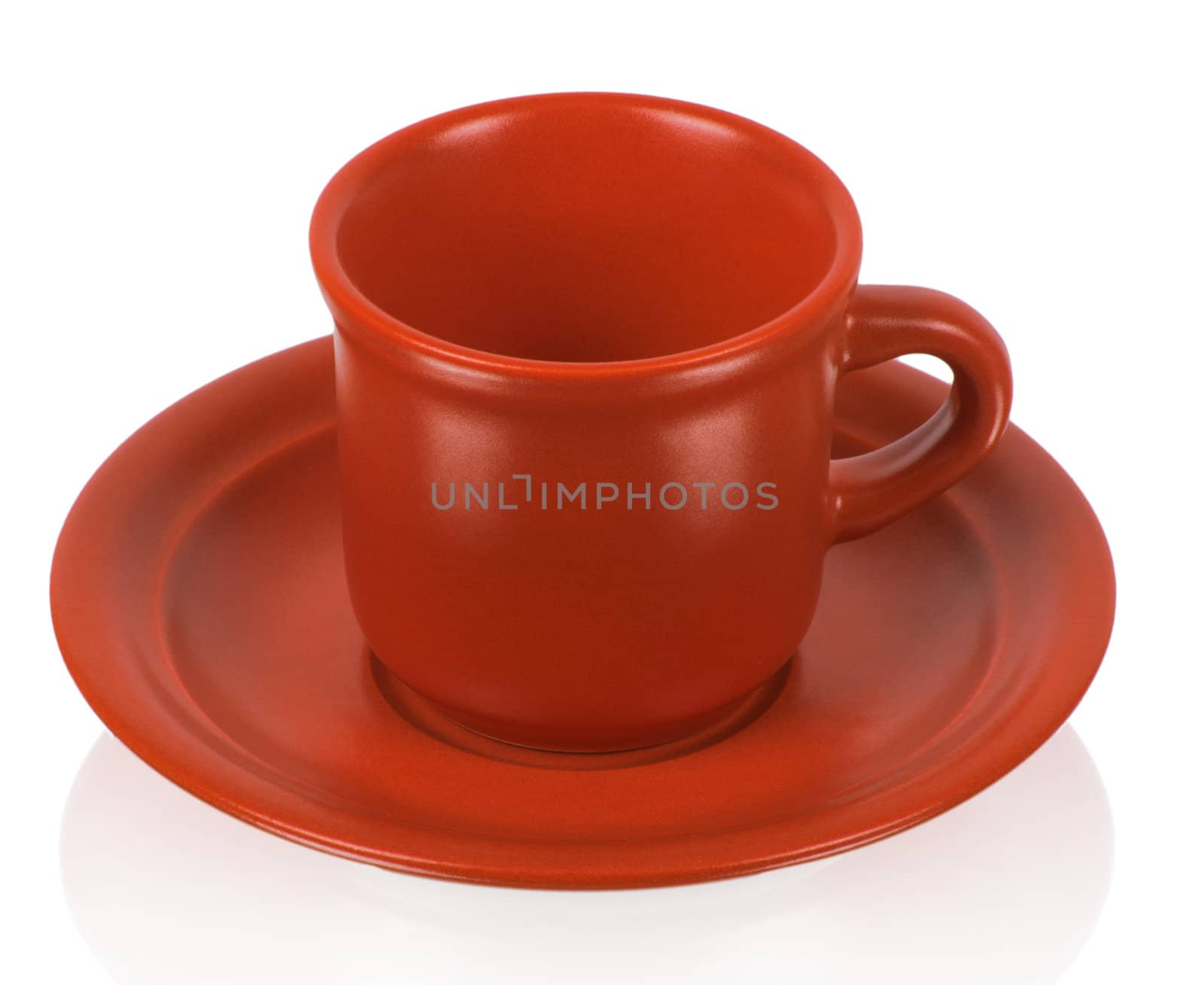 Red cup on a red saucer isolated on white background