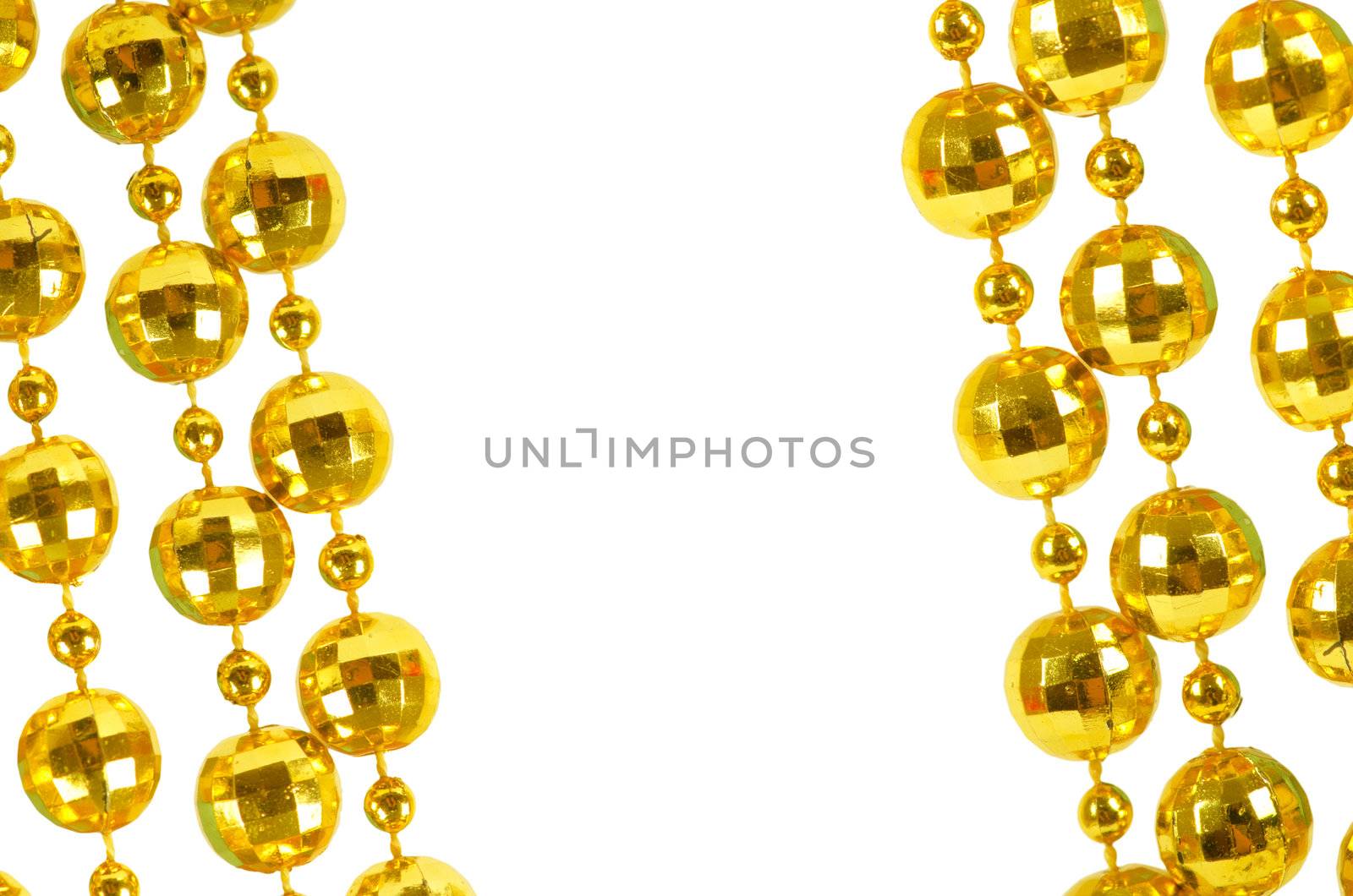 Background made of a brilliant celebratory beads of golden color