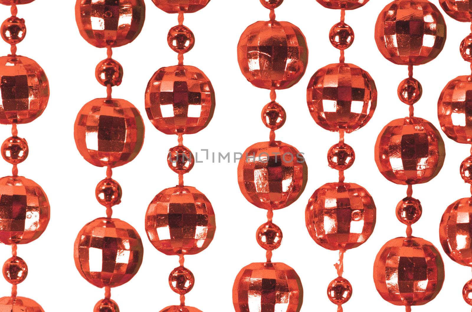 Background made of a brilliant celebratory beads of red color