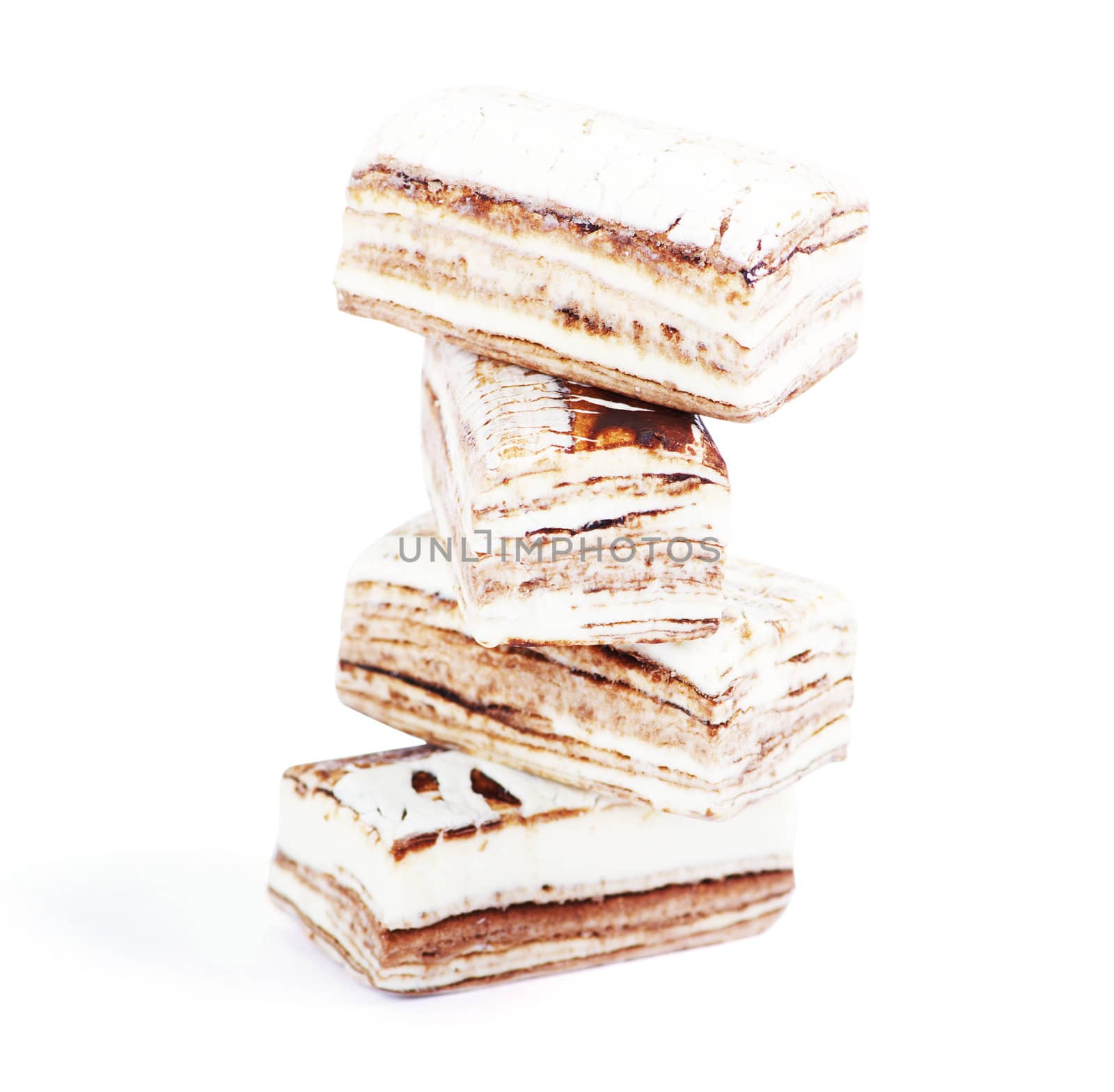 Few pieces of nougat stacked together on white