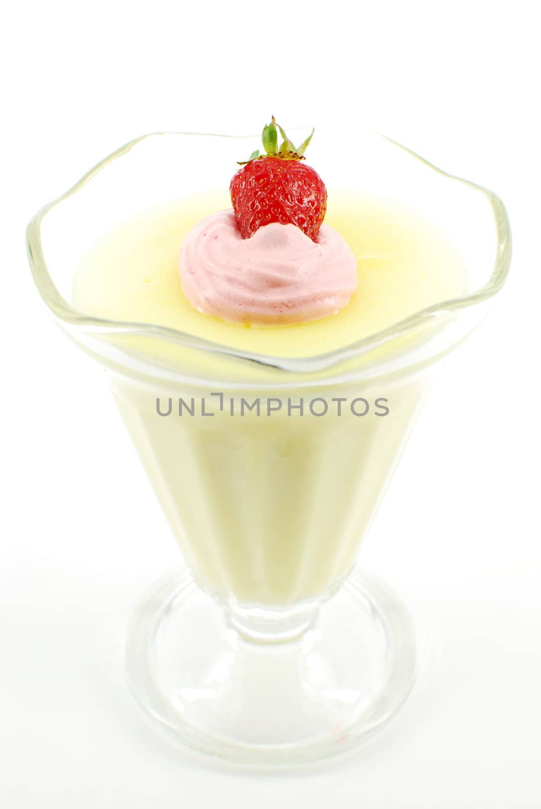 Pudding with strawberry and cream on white