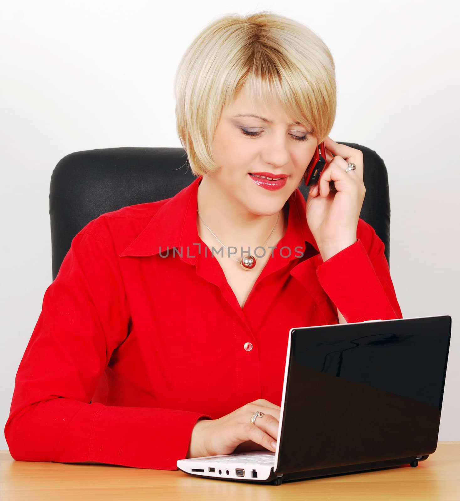 Beauty woman with laptop and phone