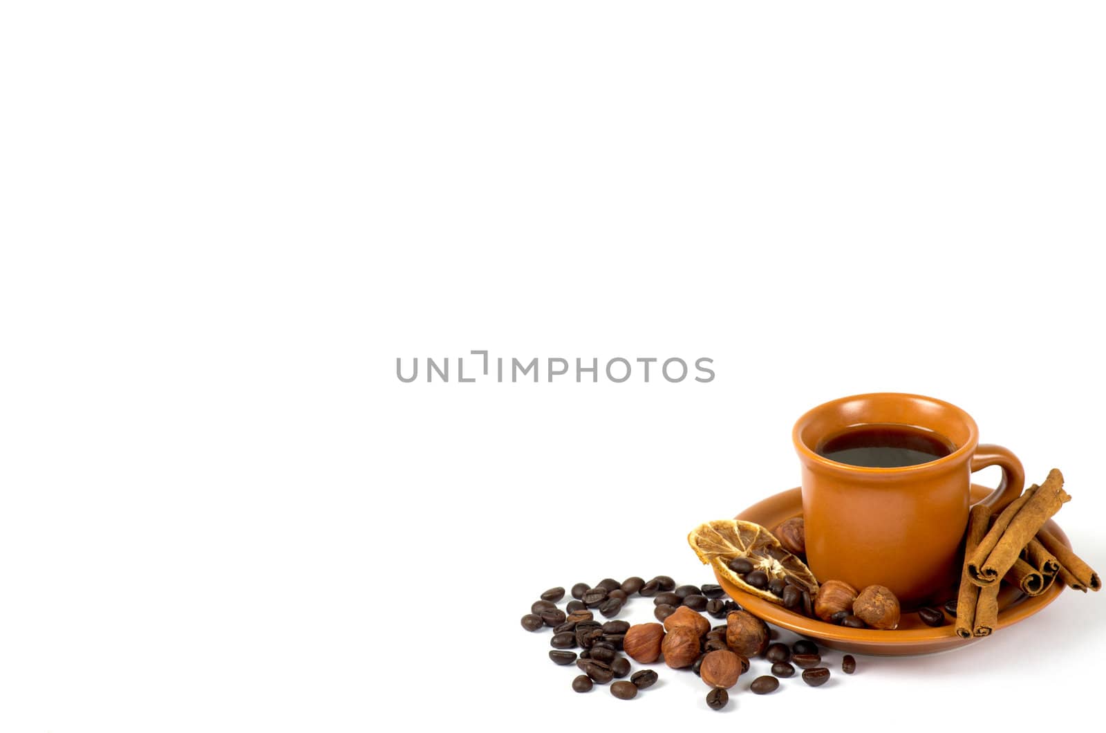 Cup of coffee with ingredients on a white background