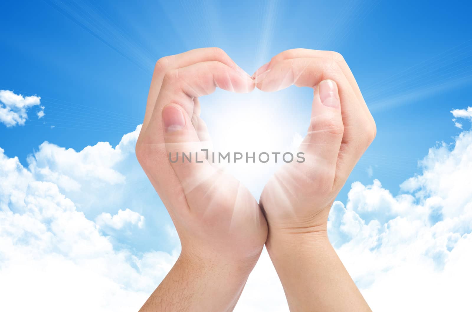 Two hands form a heart shape with their fingers