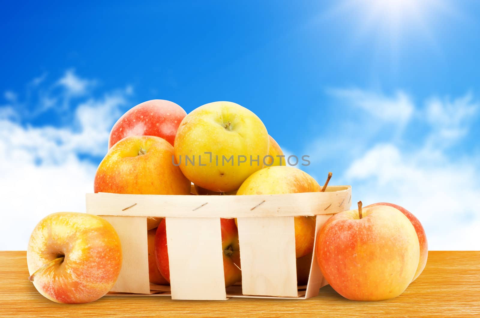 Fresh and colorful apples in basket, selective focus
