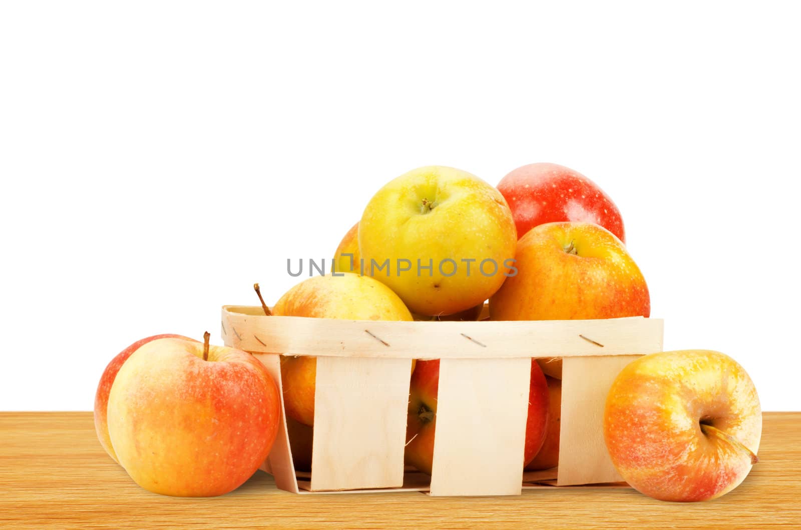 Fresh and colorful apples in basket, selective focus