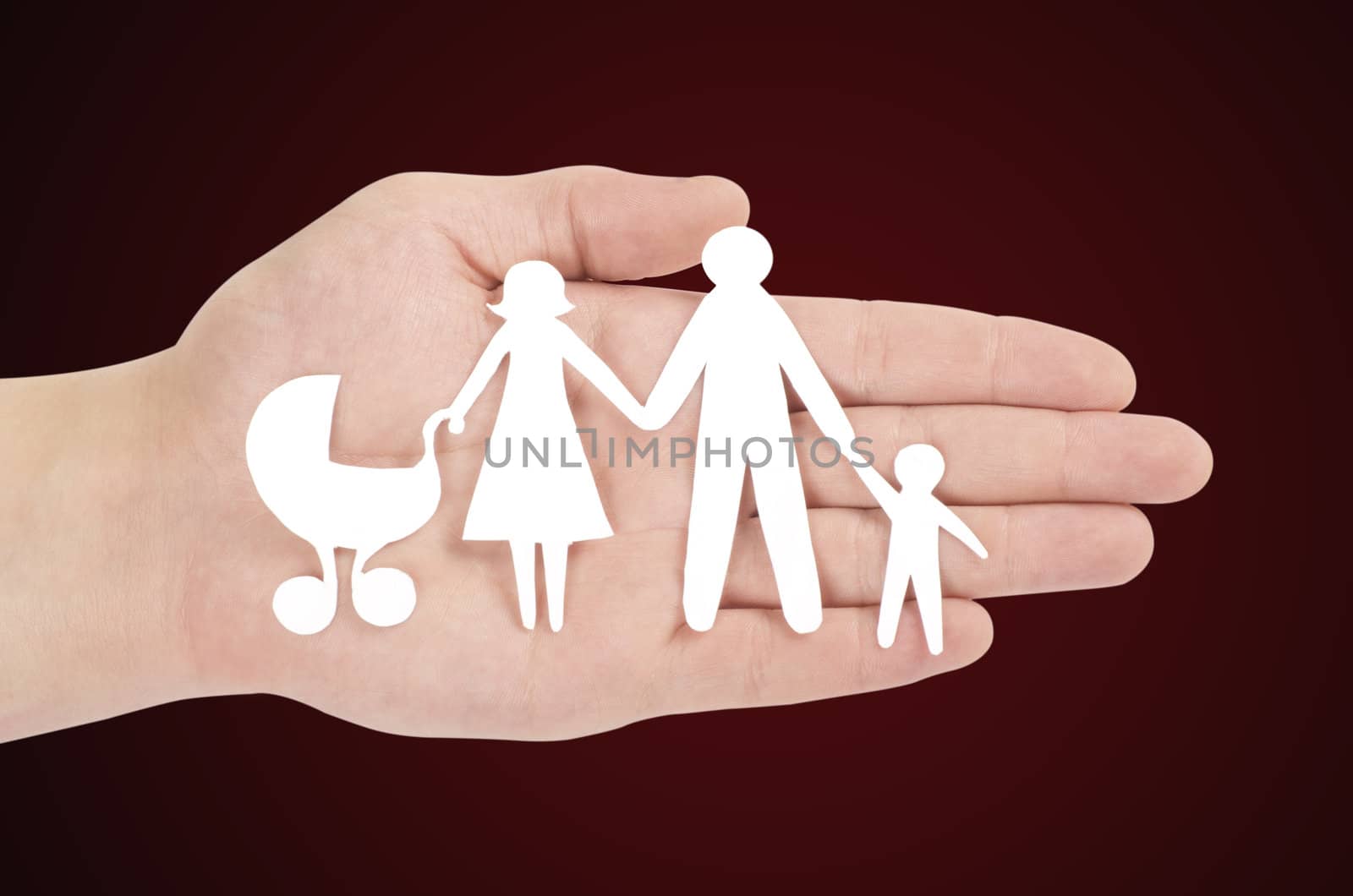 Paper family in hands