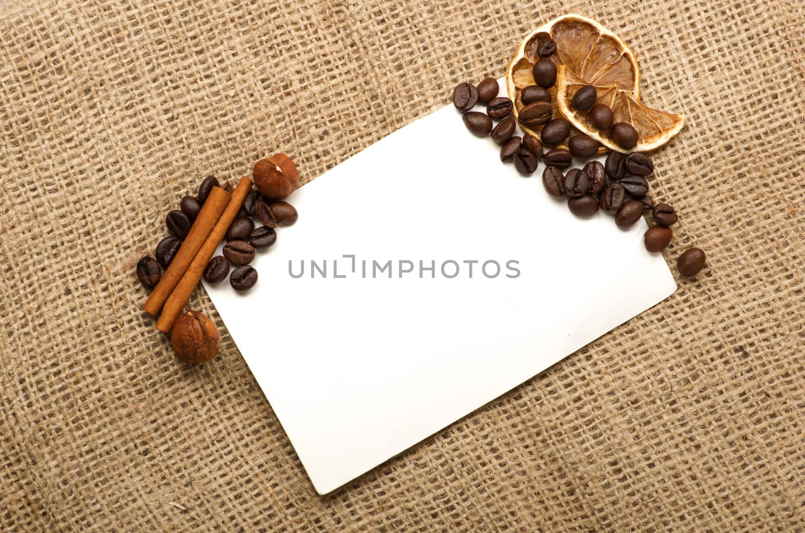 Menu Design.Old paper, coffee bean, cinnamon, lemon, burlap.