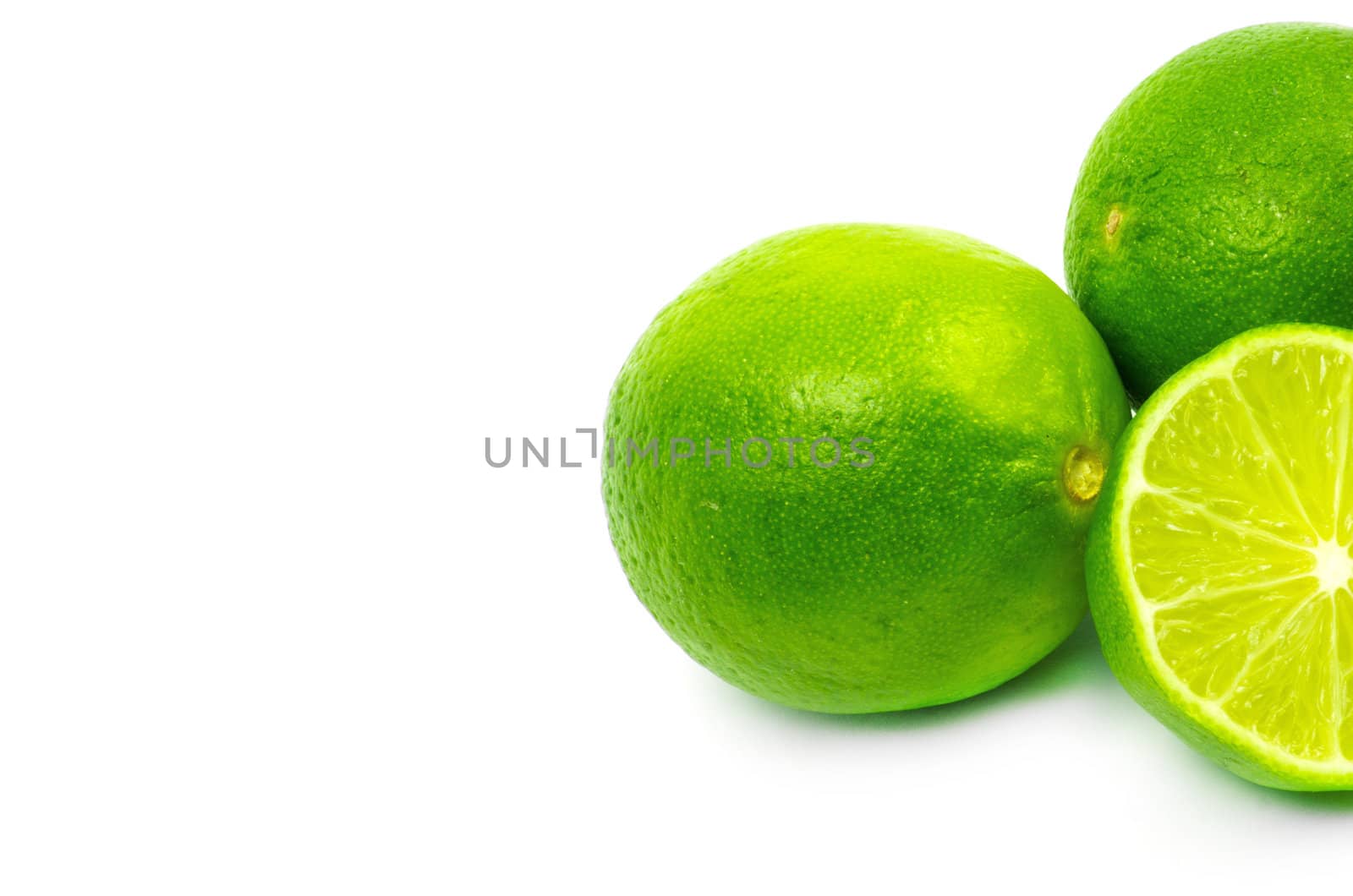 Fresh ripe lime. Isolated on white background