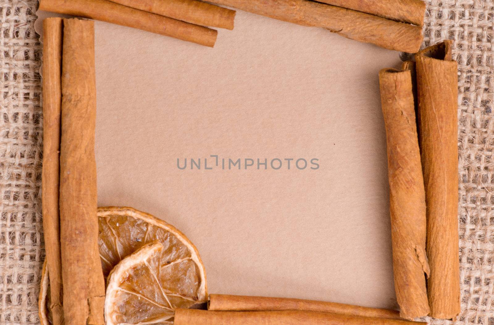 old paper for recipes and spices on burlap closeup
