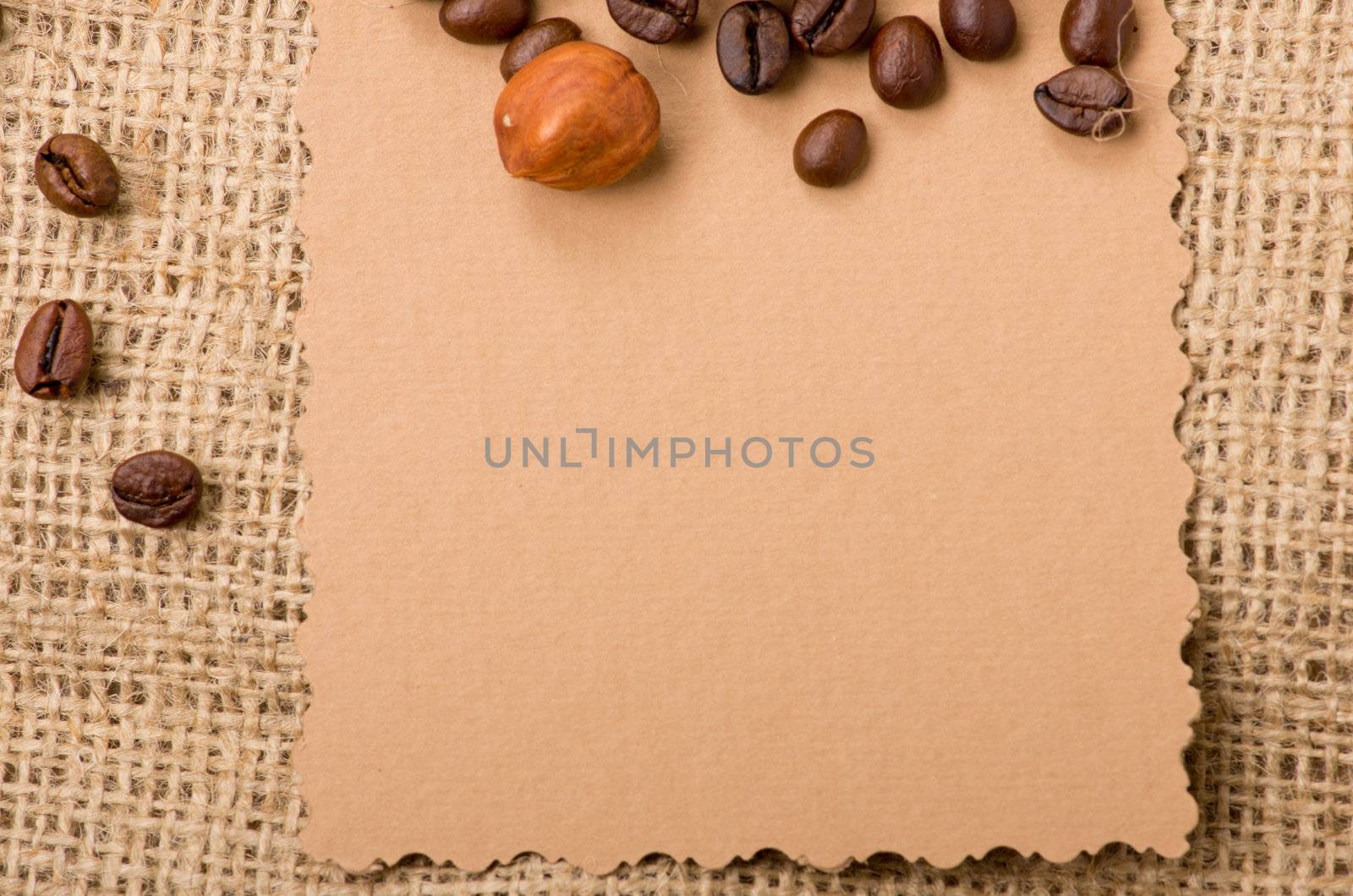 old paper for recipes and spices on burlap closeup