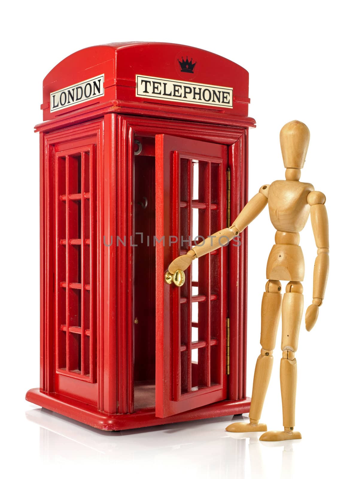 wooden puppet with a model red english telephone