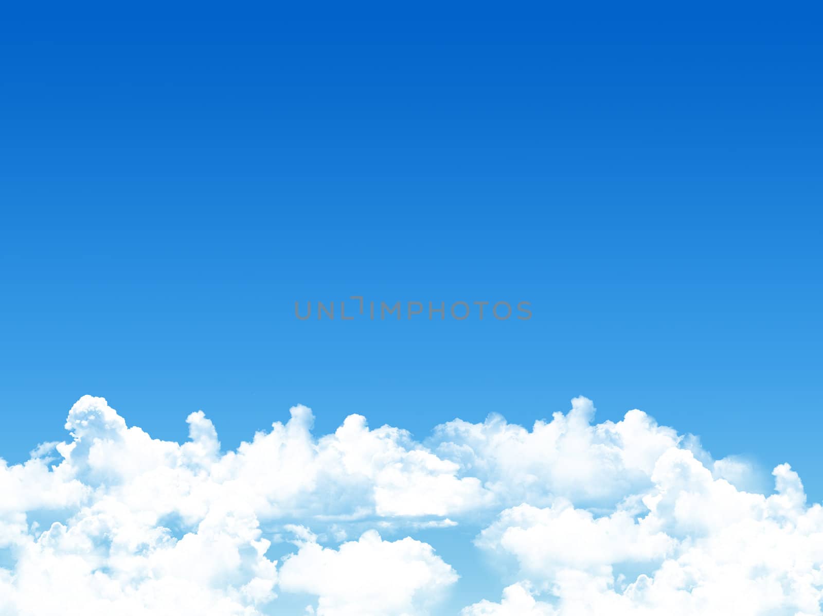 blue sky background with tiny clouds