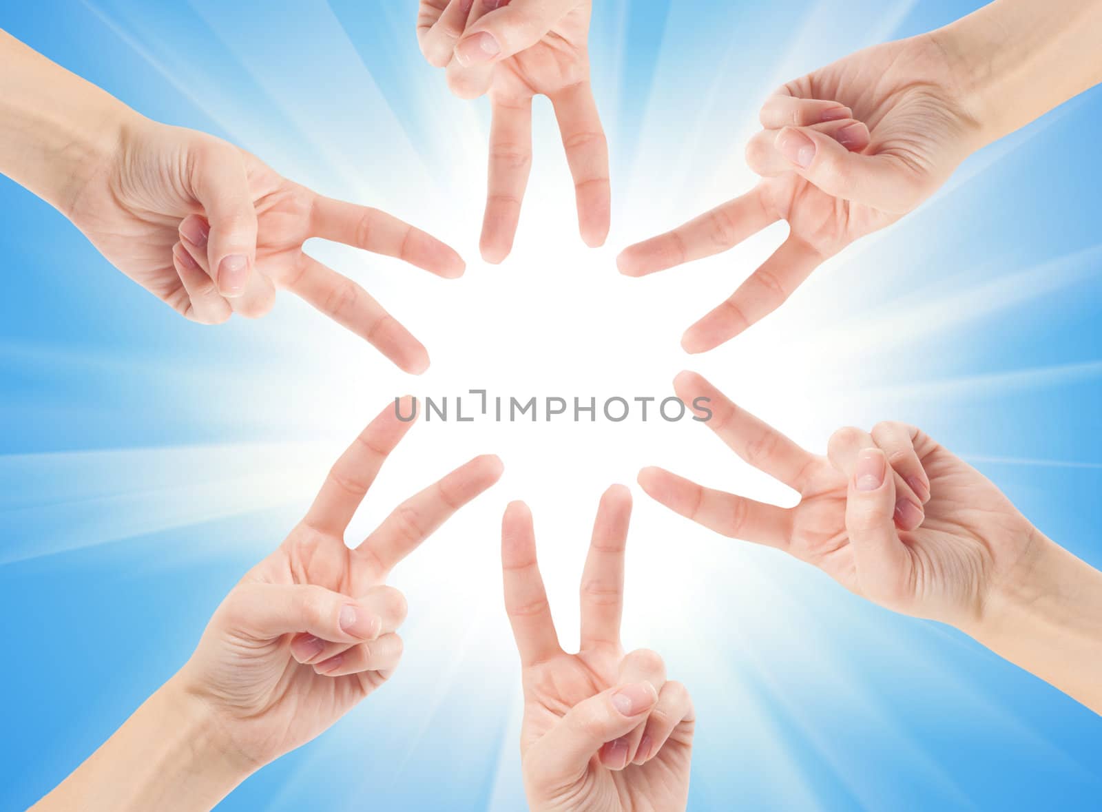 Hands of teamwork , forming the star shape