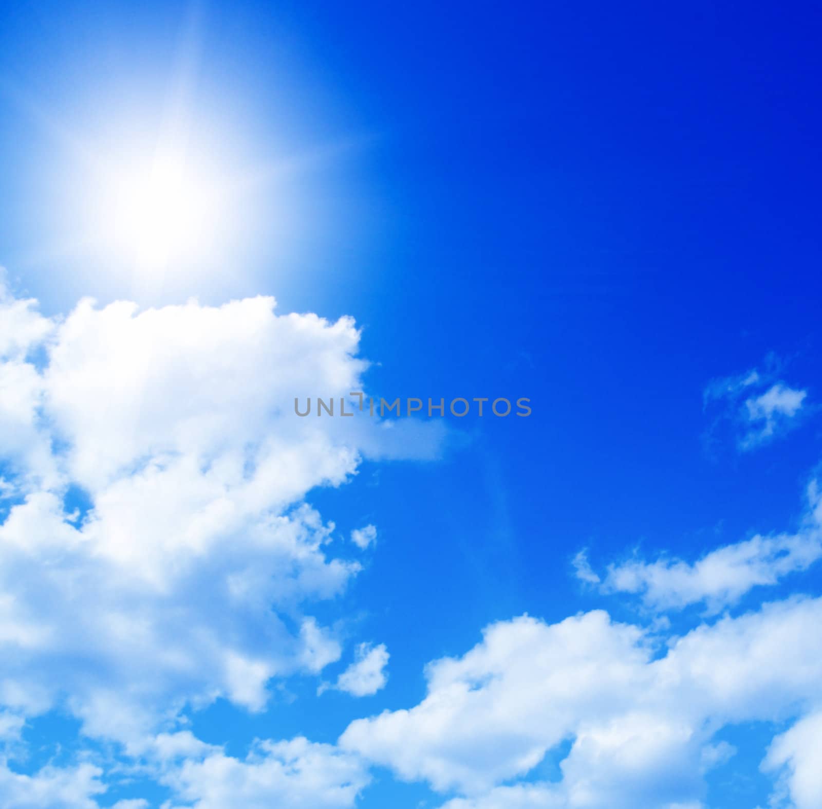 Blue sky with clouds and sun  